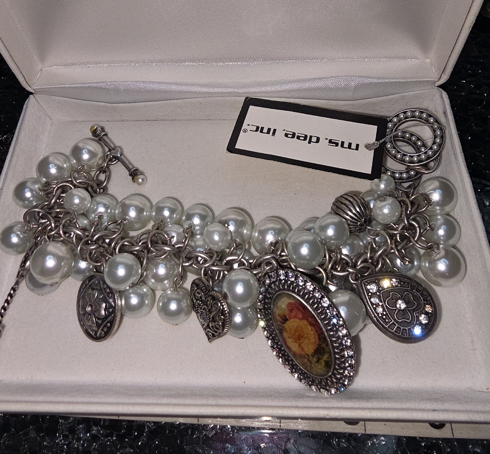 White Pearl Charm Bracelet with Mixed Silver Pendants